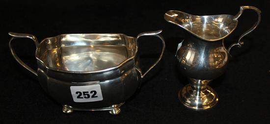 Silver cream jug and sugar bowl